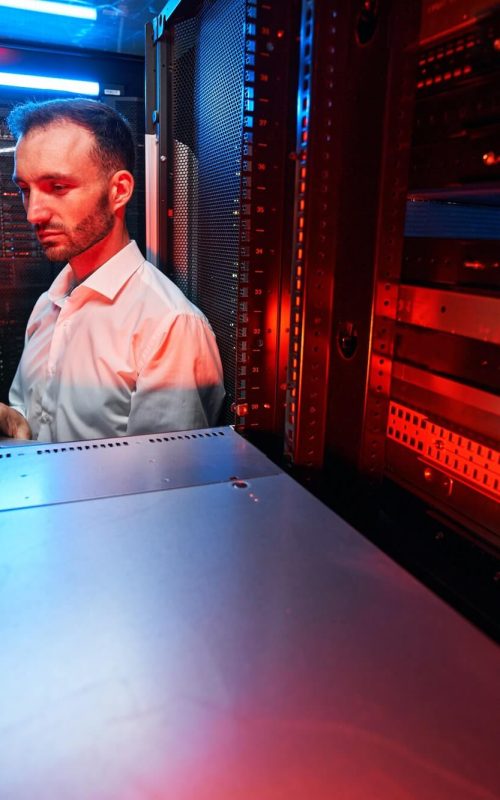 data-center-administrator-inspecting-server-rack-software-1.jpg data-center-administrator-inspecting-server-rack-software-1.jpg