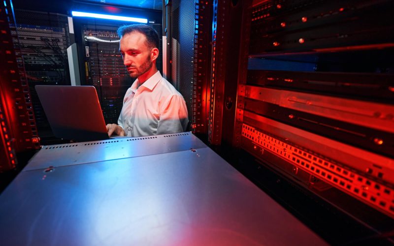 data-center-administrator-inspecting-server-rack-software-1.jpg data-center-administrator-inspecting-server-rack-software-1.jpg